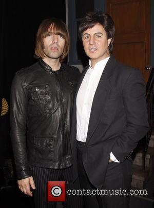 Liam Gallagher and Rain cast member Joey Curatolo Liam Gallagher and his band Beady Eye visit the cast of the...