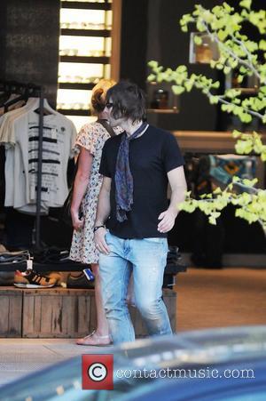 Beady Eye frontman Liam Gallagher is seen standing outside a shop in Toronto Toronto, Canada - 30.08.11