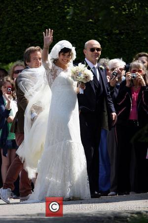 Lily Allen arriving with father Keith Allen  The wedding of Lily Allen and Sam Cooper Cranham, Gloucestershire - 11.06.11