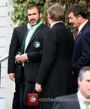 Eric Cantona leaving his the Lowry Hotel to watch the Manchester United vs New York Cosmos football match Manchester, England...