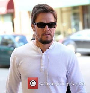 Mark Wahlberg  holding hands with his wife, as they arrive at a medical centre in Beverly Hills Los Angeles,...