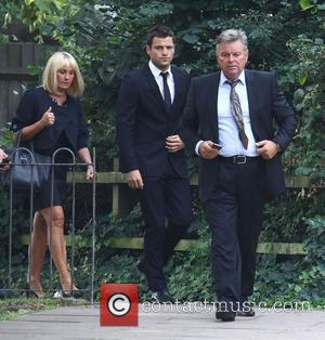 Mark Wright appears at Redbridge Magistrates Court with his mother Carol, charged with threatening and abusive behaviour London, England -...