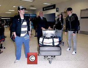 Bradley James, Katie McGrath and Colin Morgan The stars of international smash hit BBC television show Merlin arrive at LAX...