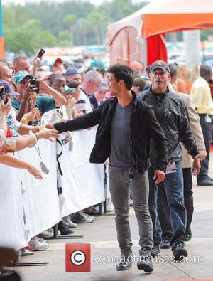 Taylor Lautner The Miami Dolphins vs The New England Patriots NFL Monday Night Football game at Sun Life Stadium -...