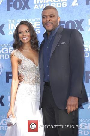 Tyler Perry and wife 42nd NAACP Image Awards at The Shrine Auditorium - Arrivals  Los Angeles, California, USA -...