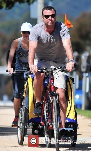 Naomi Watts and her boyfriend Liev Schreiber and their children Sasha and Sammy on a family cycle ride near the...