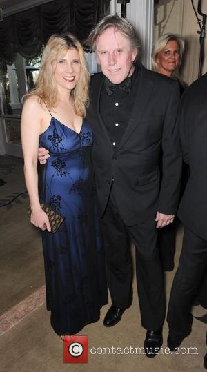 Gary Busey and Guest  The Norby Walters 21st Night of 100 Stars Awards Gala held at Beverly Hills Hotel...