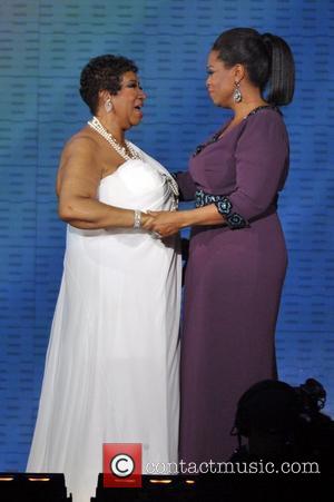 Aretha Franklin and Oprah Winfrey  during Surprise Oprah! A Farewell Spectacular at the United Center in Chicago Chicago, Illinois...