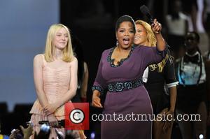 Dakota Fanning, Oprah Winfrey, and Beyonce Knowles during Surprise Oprah! A Farewell Spectacular at the United Center in Chicago Chicago,...