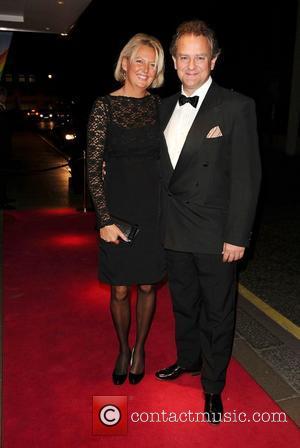 Hugh Bonneville and wife Lulu Evans arrives at the Rainbow Trust's Silver Jubilee Ball, The Savoy Hotel. London, England -...