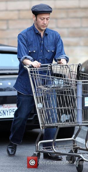 Rob Schneider fills up his car with groceries after shopping at Whole Foods Studio City, California - 11.11.11