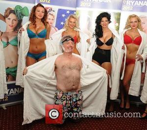 Michael O'Leary and Ryanair female cabin crew  Ryanair boss Michael O'Leary and female cabin crew members strip off at...