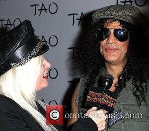 Sally Steel and Slash Slash hosts his concert after party at Tao nightclub inside The Venetian Resort and Casino Las...