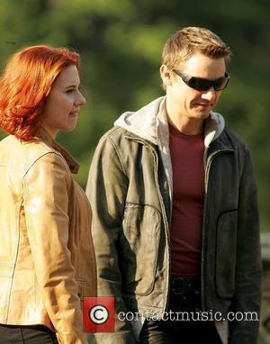 Scarlett Johansson and Jeremy Renner actors on the set of 'The Avengers' shooting on location in Manhattan New York City,...