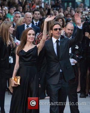 Angelina Jolie and Brad Pitt 36th Annual Toronto International Film Festival - 'Moneyball' - Premiere held at the The Roy...