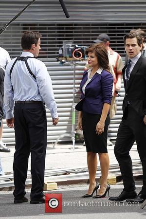 Tim DeKay,Tiffani Thiessen and Matthew Bomer filming on the set of 'White Collar' in Manhattan New York City, USA -...