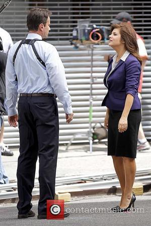 Tim DeKay and Tiffani Thiessen shooting on the set of 'White Collar' in Manhattan New York City, USA - 30.06.11