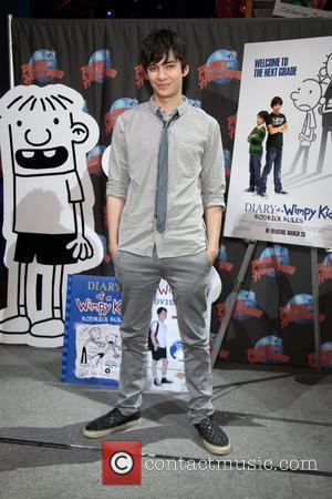 Devon Bostick Stars of 'Diary Of A Wimpy Kid: Rodrick Rules' visit Planet Hollywood Times Square New York City, USA...