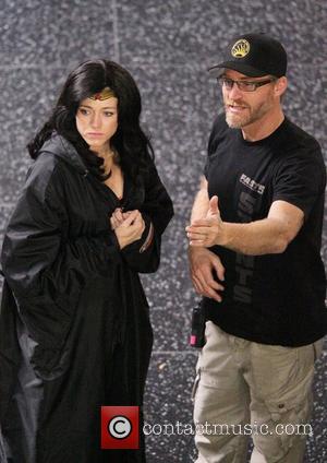Adrianne Palicki talks with a production member whilst filming scenes for 'Wonder Woman'  Hollywood, California - 31.03.11