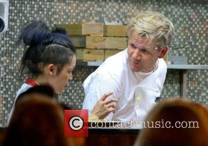 Gordon Ramsay with trainee chef Gun in the restaurant at Hotel GB London, England - 02.10.12