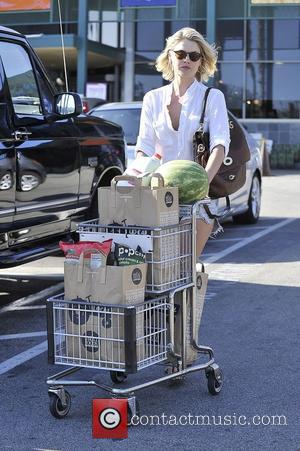 Ali Larter leaves Whole Foods in West Hollywood. The actress had a wardrobe malfunction after accidentally dropping one of her...