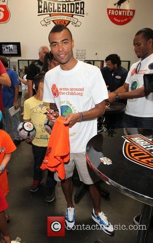 Ashley Cole Professional football players from the English Premier League host an event at Eaglerider Motorcycles in support of 'armsaroundthechild.org'...