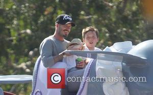 David Beckham, Harper Beckham and Brooklyn Beckham ,  Beckham family on a day out to Disneyland. Los Angeles, California...