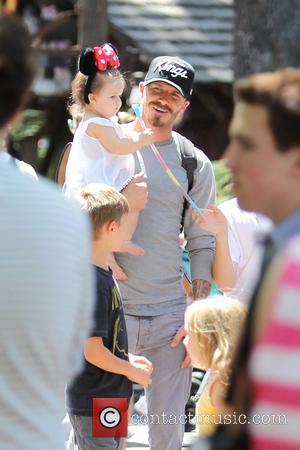 David Beckham, Harper Beckham,  Beckham family on a day out to Disneyland. Los Angeles, California - 06.06.12