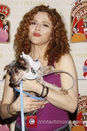 Bernadette Peters holds Woody, a dog up for adoption Broadway Barks: The 14th Annual Dog and Cat Adopt-a-thon held in...