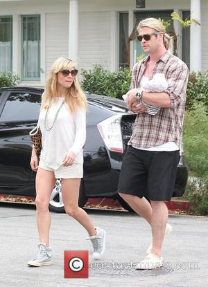 Elsa Pataky, husband Chris Hemsworth and their daughter India Rose in Santa Monica after having lunch at Kaffe K on...