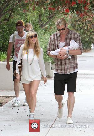 Elsa Pataky, husband Chris Hemsworth and their daughter India Rose out and about in Santa Monica. Chris looks smitten as...