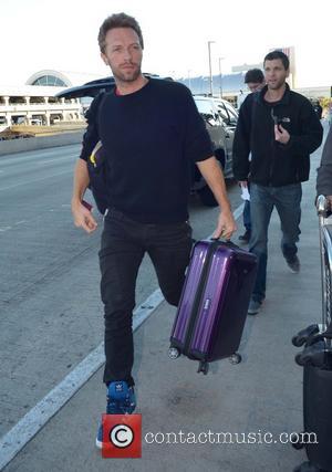 Chris Martin Chris Martin arrives at LAX airport  Featuring: Chris Martin Where: Los Angeles, California, United States When: 12...