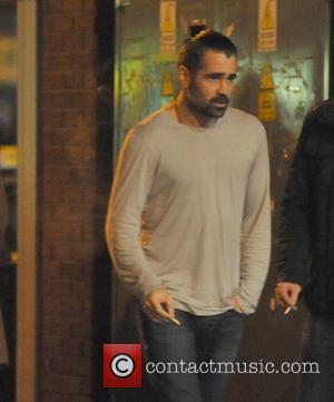 Colin Farrell Colin Farrell looking disheveled and sporting a full beard is seen smoking and enjoys a night out with...