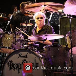 Deep Purple's Ian Paice performing on stage at the O2 Arena as part of Deep Purple with a 32 piece...