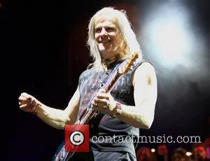 Deep Purple's Steve Morse performing on stage at the O2 Arena as part of Deep Purple with a 32 piece...