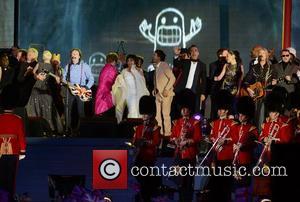 Paul McCartney performs during the Queen's Diamond Jubilee Concert at Buckingham Palace London, England - 04.06.12