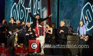 Paul McCartney performs with Will.i.am, Cheryl Cole, Tom Jones and others at The Diamond Jubilee Concert at Buckingham Palace. London,...