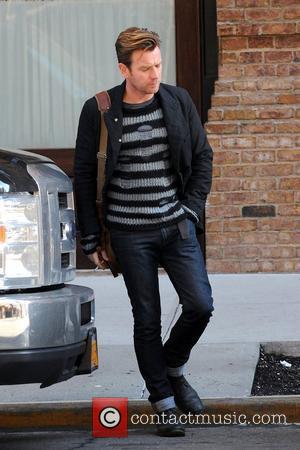 Ewan McGregor leaving his Manhattan hotel with turn up jeans and smoking a cigarette. New York City, USA - 24.01.12