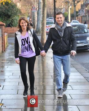 Harry Judd and girlfriend Izzy Johnston   arriving at Fearne Cotton's house for her Christmas Party  London, England...
