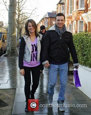 Harry Judd and girlfriend Izzy Johnston  leaving Fearne Cotton's house after her Christmas Party London, England - 22.12.11