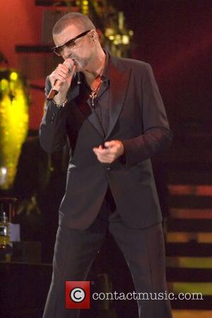 George Michael performing during his Symphonica Tour at the SECC Glasgow, Scotland - 23.09.12