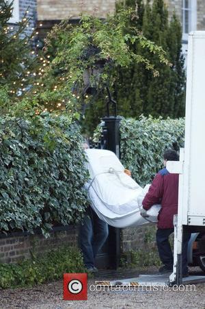 A bed being delivered to George Michael's house London, England - 21.12.11