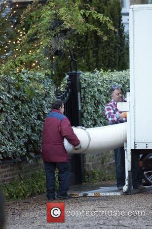 A bed being delivered to George Michael's house London, England - 21.12.11