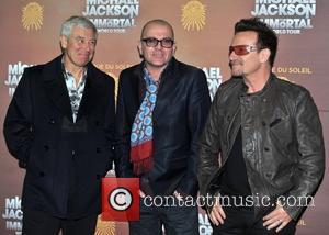 Adam Clayton, Bono and guest Michael Jackson: The Immortal World Tour, stage production of Cirque Du Soleil - European premiere...