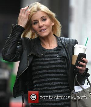 Michelle Collins Michelle Collins carries a takeaway Starbucks drink as she leaves the ITV studios  Featuring: Michelle Collins Where:...