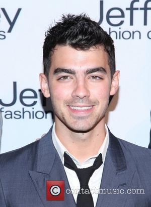 Joe Jonas Jeffrey Fashion Cares 2012 held at the Intrepid Aircraft Carrier  New York City, USA - 26.03.12