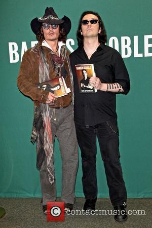 Johnny Depp (L) and Damien Echols attend Damien Echols In Conversation With Johnny Depp at Barnes & Noble Union Square...