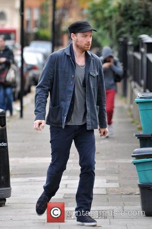 Jonny Buckland of Coldplay walking to the gym London, England - 01.12.11