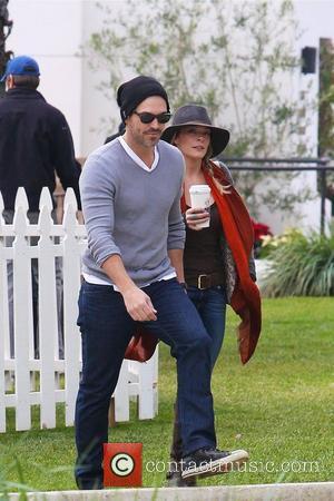 LeAnn Rimes and Eddie Cibrian arrive as a guest at a 'Cookies For Kids Cancer' charity event in Malibu Malibu,...