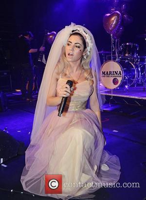 Marina Diamandis of Marina and The Diamonds performs in a wedding dress at G-A-Y London, England - 14.04.12